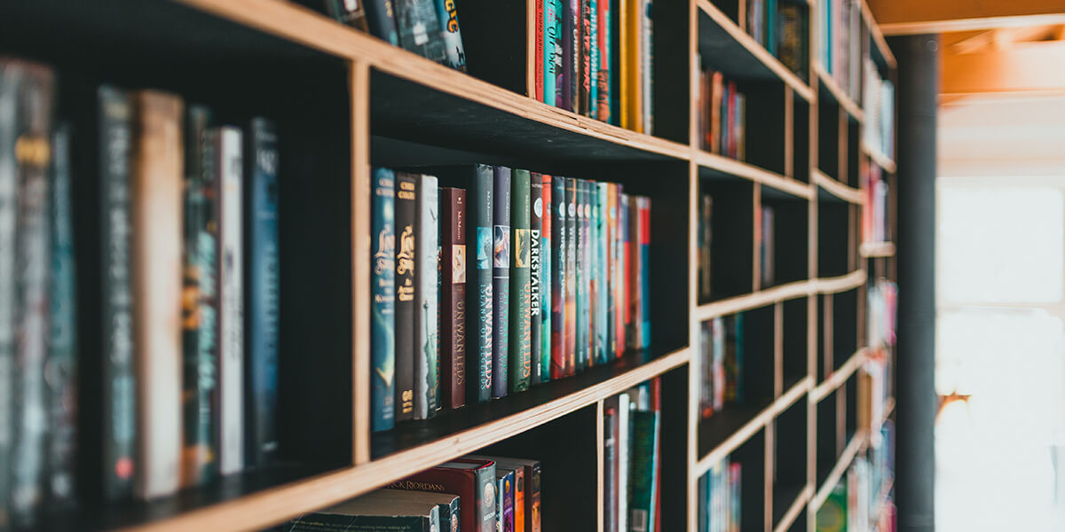 A book shelf filled with an assortment of books. 3D rendering, design studio, 3D product, animation, character design, 2D animation, video production services, book trailer services, digital marketing services, motion design, motion graphics. RDV Media – Multimedia production company. Serving brands globally. New York, Los Angeles, California, Atlanta, USA, Dublin, Ireland, EU, London, England, UK, Doha, Qatar, UAE, Abu Dhabi, Ajman, Dubai, Fujairah, Ras Al Khaimah, Sharjah, and Umm Al Quwain.